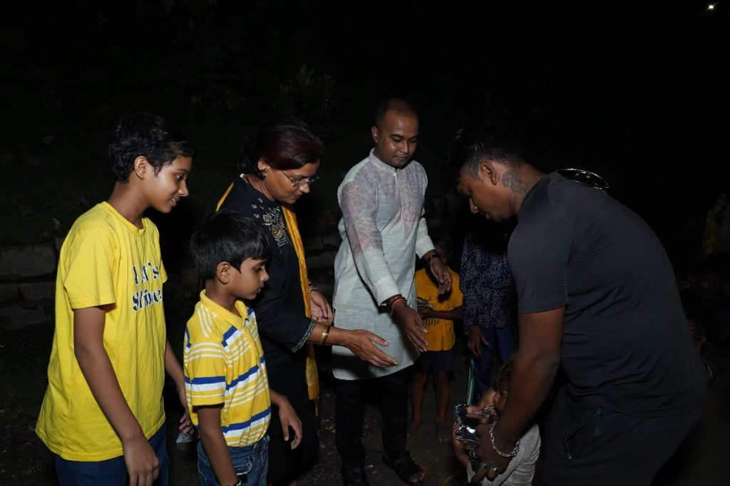 Poet Sudip Chandra Halder Leads Food Distribution Drive in Kashi on Vijaya Dashami